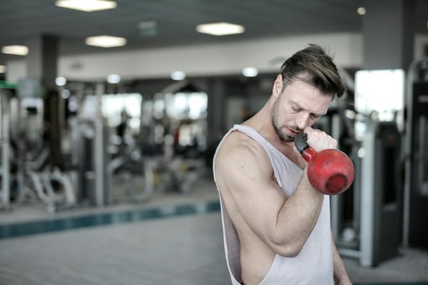 What are the specific benefits of kettlebell training for core strength?
